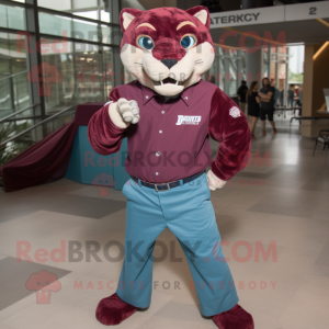 Maroon Puma mascot costume character dressed with a Denim Shirt and Belts