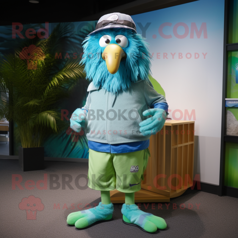 Cyan Kiwi mascot costume character dressed with a Bermuda Shorts and Belts