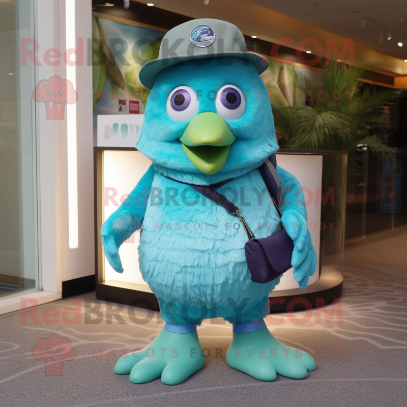 Cyan Kiwi mascot costume character dressed with a Bermuda Shorts and Belts