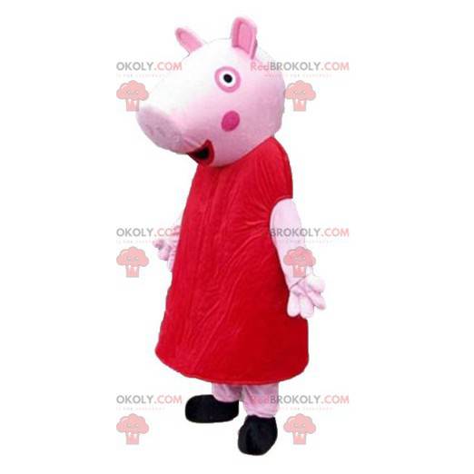 Rosa Schweinemaskottchen gekleidet in ein rotes Kleid -