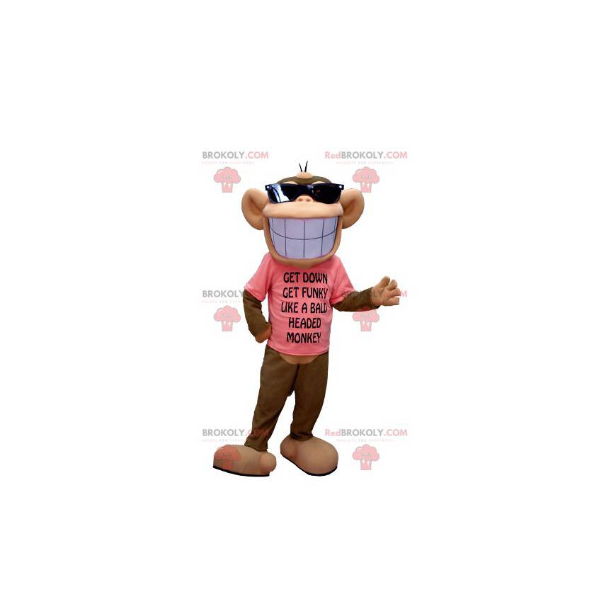 Mascote macaco marrom e bege com um largo sorriso - Mascote macaco marrom e bege com um largo sorriso -