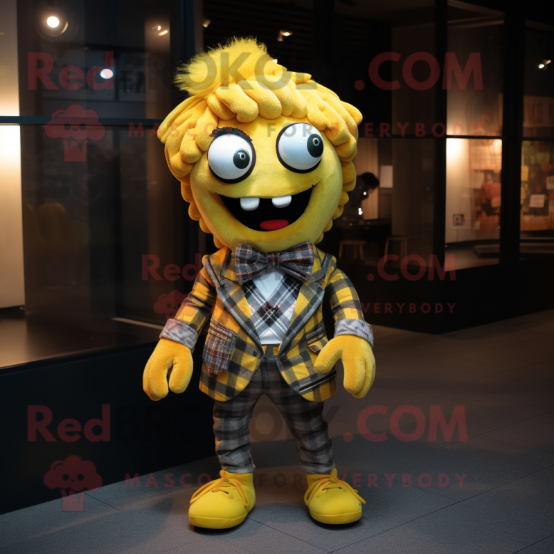 Yellow Medusa mascot costume character dressed with a Flannel Shirt and Bow ties Yellow Medusa mascot costume character dressed with a Flannel Shirt and Bow ties