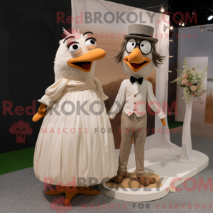 Beige Blackbird maskot...