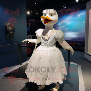 White Blackbird mascot costume character dressed with a Ball Gown and Suspenders