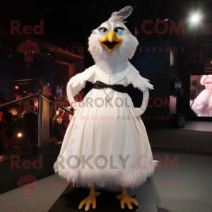 White Blackbird mascot costume character dressed with a Ball Gown and Suspenders