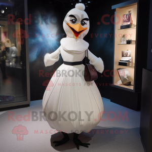 White Blackbird mascot costume character dressed with a Ball Gown and Suspenders