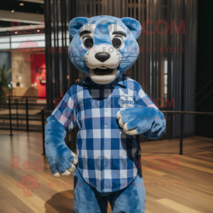 Blue Puma mascot costume character dressed with a Flannel Shirt and Earrings