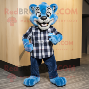 Blue Puma mascot costume character dressed with a Flannel Shirt and Earrings