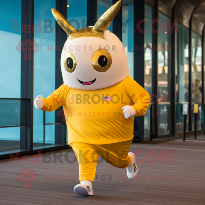 Gold Narwhal mascot costume character dressed with a Running Shorts and Headbands