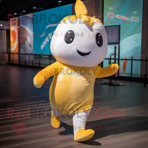 Gold Narwhal mascot costume character dressed with a Running Shorts and Headbands