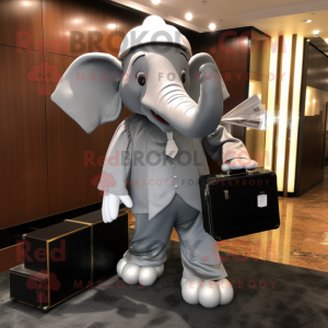 Silver Elephant mascot costume character dressed with a Evening Gown and Briefcases