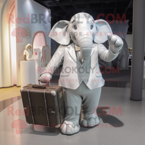 Silver Elephant mascot costume character dressed with a Evening Gown and Briefcases