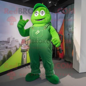 Green Knife Thrower mascot costume character dressed with a Dungarees and Rings