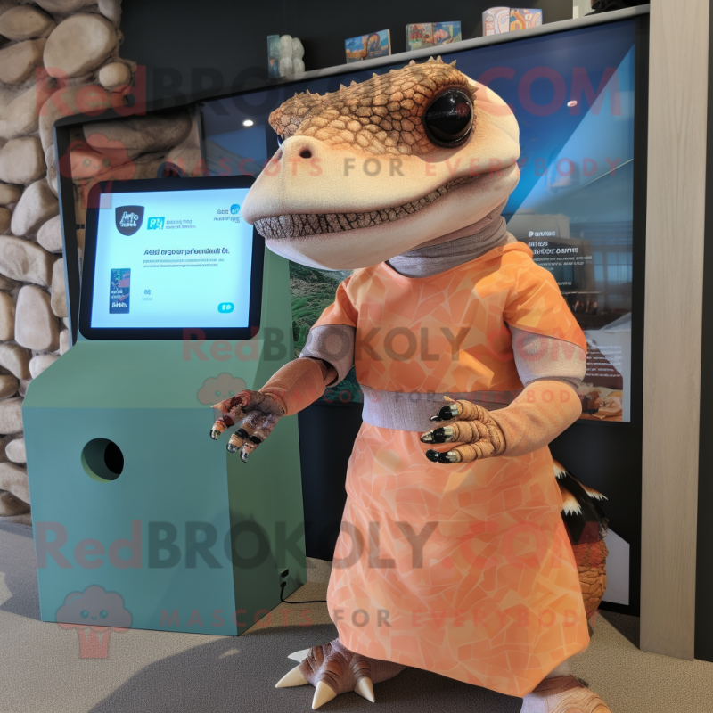 Peach Komodo Dragon mascot costume character dressed with a Bikini and Smartwatches