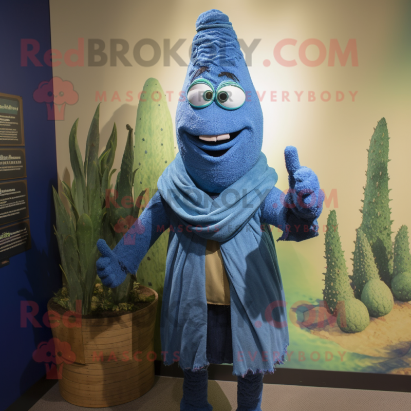 Blue Asparagus mascot costume character dressed with a Henley Shirt and Shawl pins