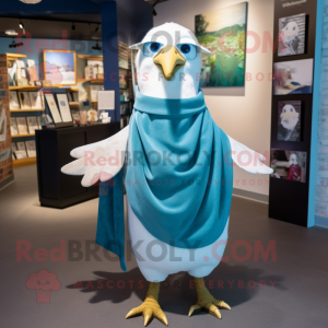 Cyan Gull mascot costume character dressed with a Trousers and Shawl pins