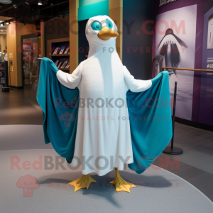 Cyan Gull mascot costume character dressed with a Trousers and Shawl pins