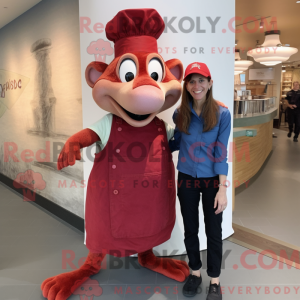 Maskot karakter af en rød...