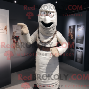 Maskot postava bílé mumie...