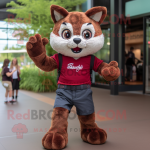 Maroon Bobcat mascot costume character dressed with a Denim Shorts and Mittens