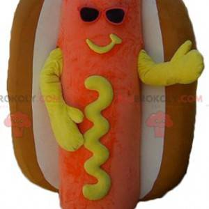 Reusachtige oranje gele en bruine hotdogmascotte -