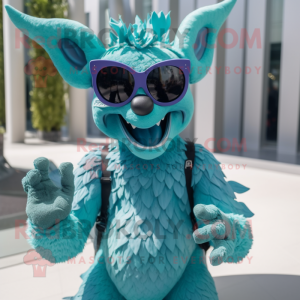 Cyan Demon mascot costume character dressed with a Romper and Sunglasses