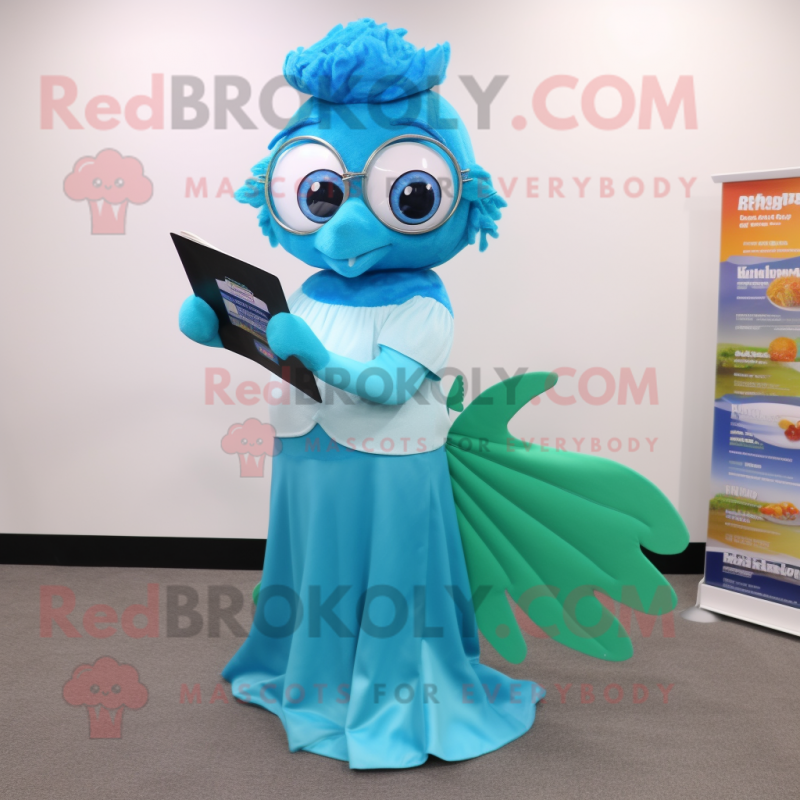 Cyan Betta Fish mascot costume character dressed with a A-Line Dress and Reading glasses Cyan Betta Fish mascot costume character dressed with a A-Line Dress and Reading glasses