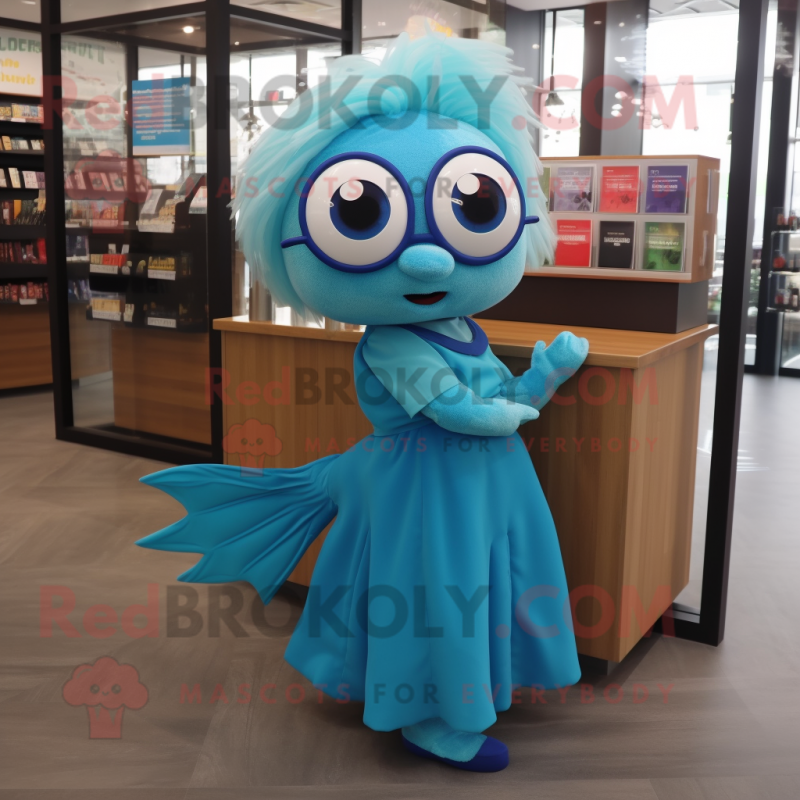 Cyan Betta Fish mascot costume character dressed with a A-Line Dress and Reading glasses