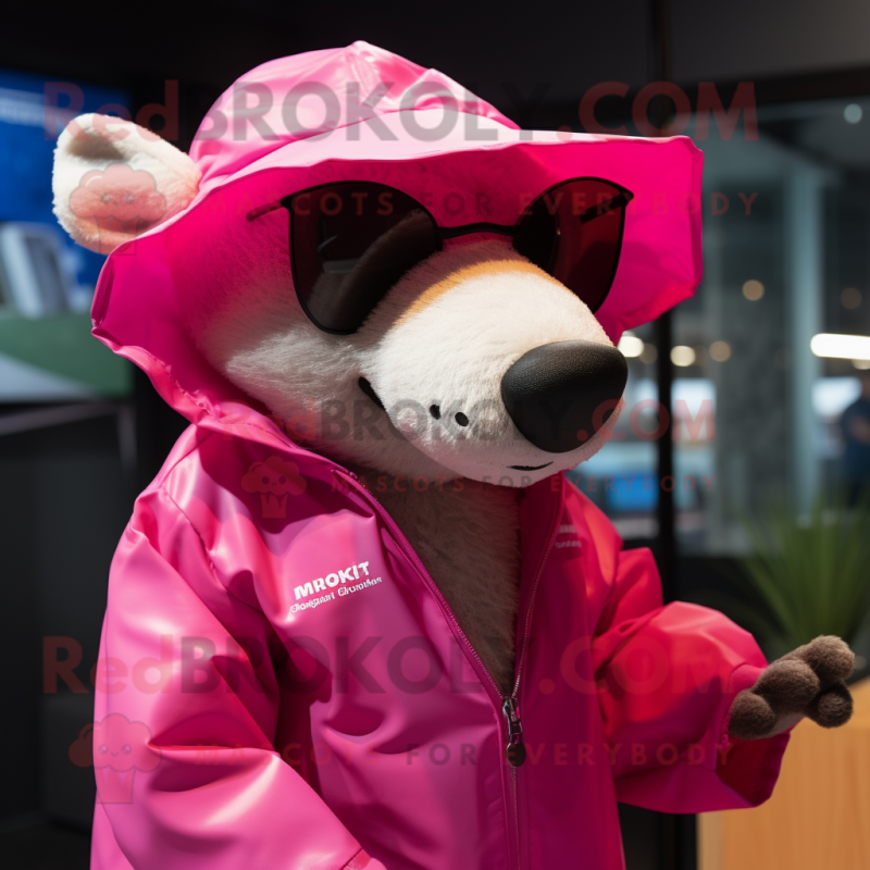 Pink Badger mascot costume character dressed with a Raincoat and Sunglasses