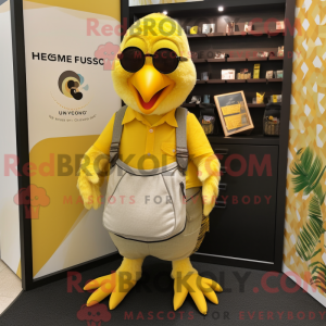Maskotfigur af en citrongul...