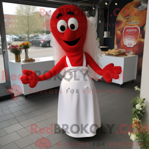 Maskotkarakter av en rød...