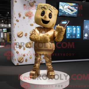 Maskot karakter af en guld...