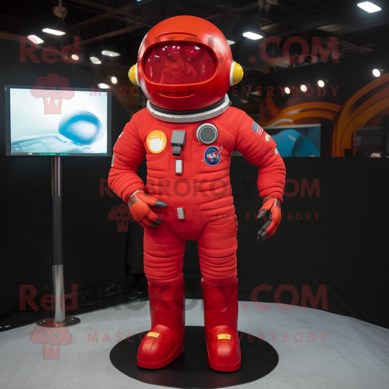 Red Astronaut mascot costume character dressed with a Flare Jeans and Anklets Red Astronaut mascot costume character dressed with a Flare Jeans and Anklets