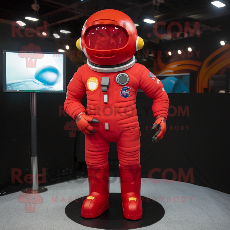 Red Astronaut mascot costume character dressed with a Flare Jeans and Anklets