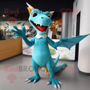 Cyan Pterodactyl mascot costume character dressed with a Graphic Tee and Gloves