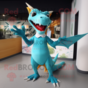 Cyan Pterodactyl mascot costume character dressed with a Graphic Tee and Gloves