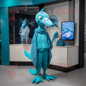 Cyan Pterodactyl mascot costume character dressed with a Graphic Tee and Gloves