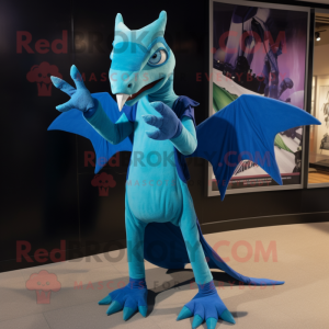 Cyan Pterodactyl mascot costume character dressed with a Graphic Tee and Gloves