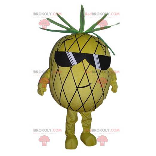 Mascota de piña amarilla y verde con gafas de sol -