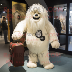 Cream Yeti mascot costume character dressed with a Suit Pants and Handbags