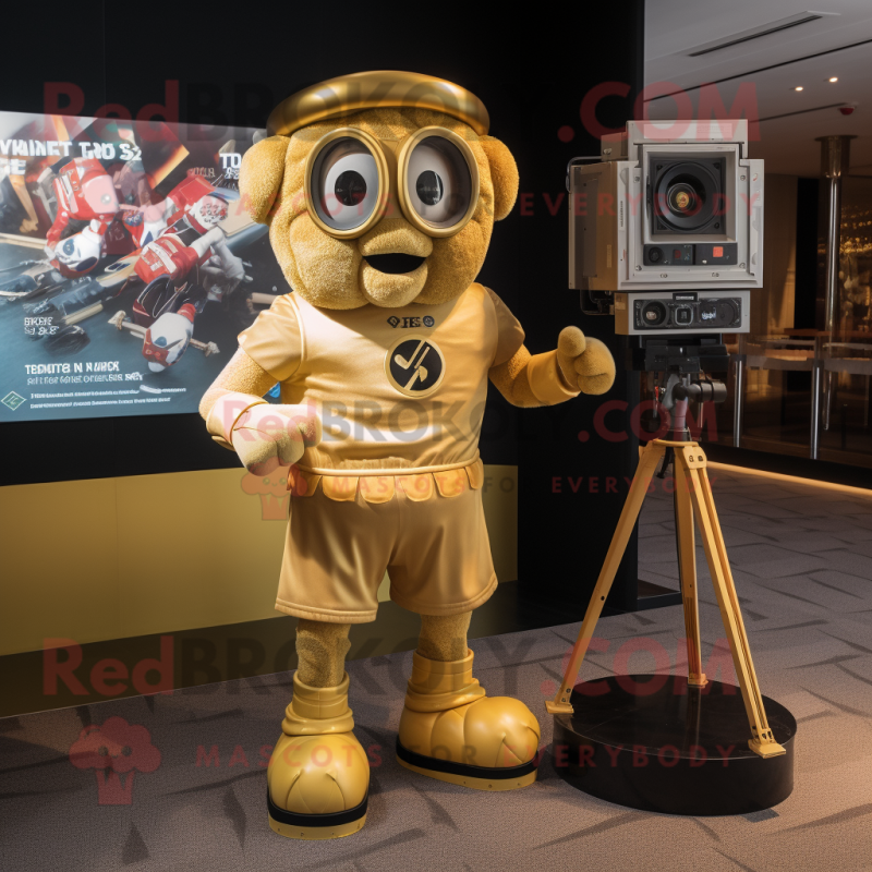 Gold Camera mascot costume character dressed with a Rugby Shirt and Anklets