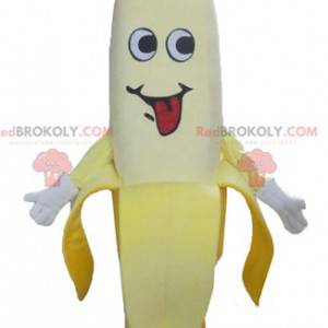 Mascotte gigante banana gialla con un berretto rosa -