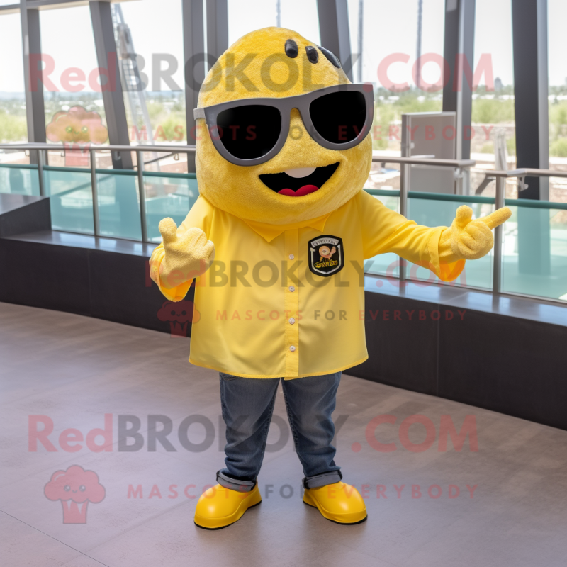 Lemon Yellow Nachos mascot costume character dressed with a Button-Up Shirt and Sunglasses Lemon Yellow Nachos mascot costume character dressed with a Button-Up Shirt and Sunglasses