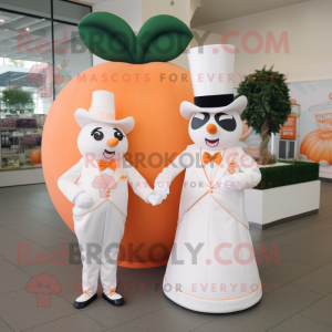 Peach Ring Master mascot costume character dressed with a Wedding Dress and Pocket squares