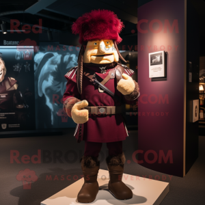 Maroon Soldier mascot costume character dressed with a Rugby Shirt and Shawl pins
