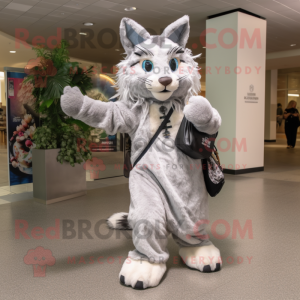 Gray Lynx mascot costume character dressed with a Maxi Dress and Messenger bags