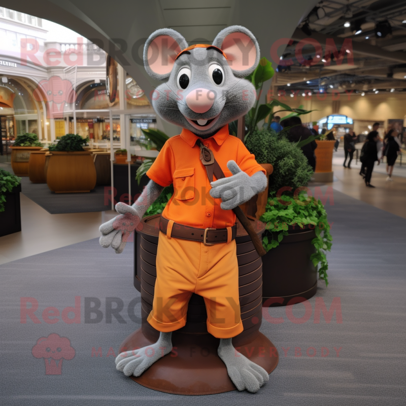 Orange Ratatouille mascot costume character dressed with a Cargo Pants and Bracelet watches Orange Ratatouille mascot costume character dressed with a Cargo Pants and Bracelet watches