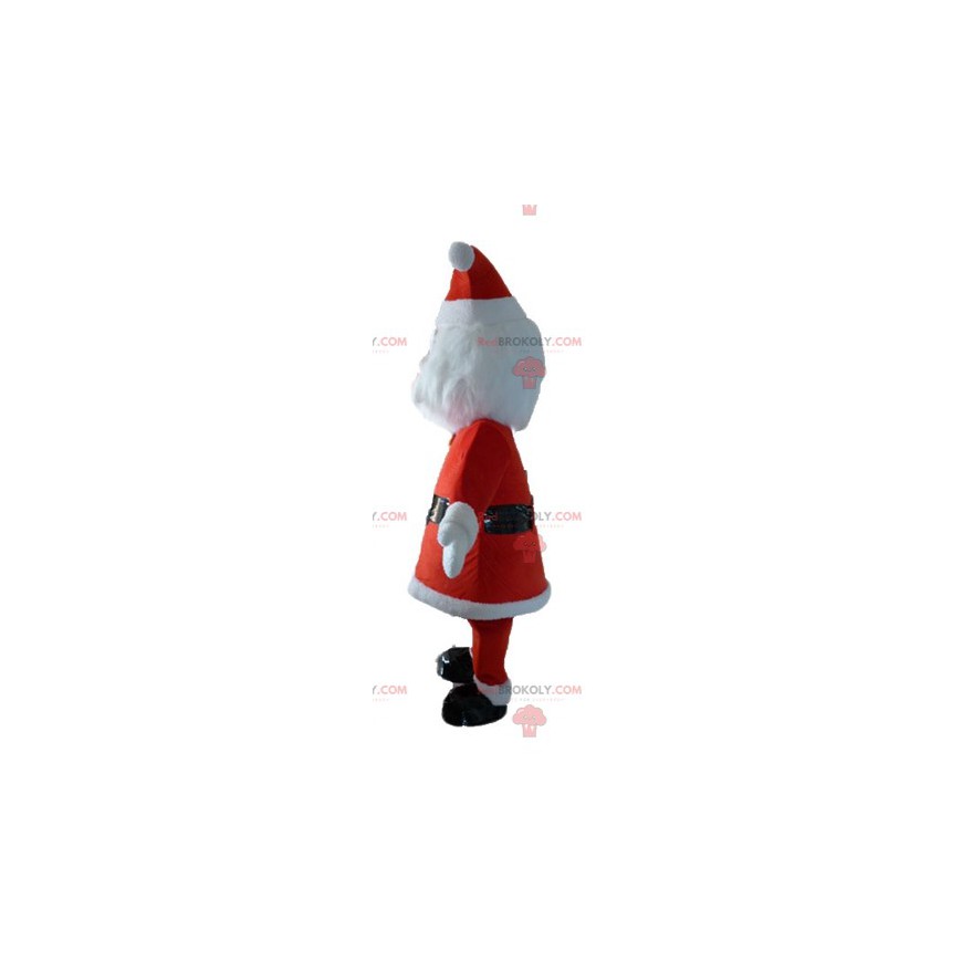 Santa Claus maskot klädd i rött och vitt med ett skägg -