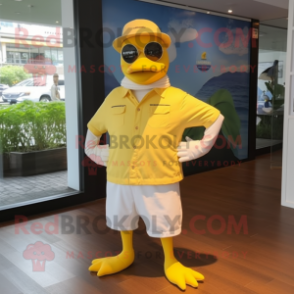 Yellow Albatross mascot costume character dressed with a Polo Tee and Berets