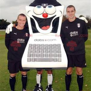 Mascotte d'ordinateur noir et blanc avec son clavier -